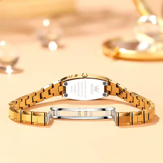 Montre bracelet femme couleur or photo fermoir