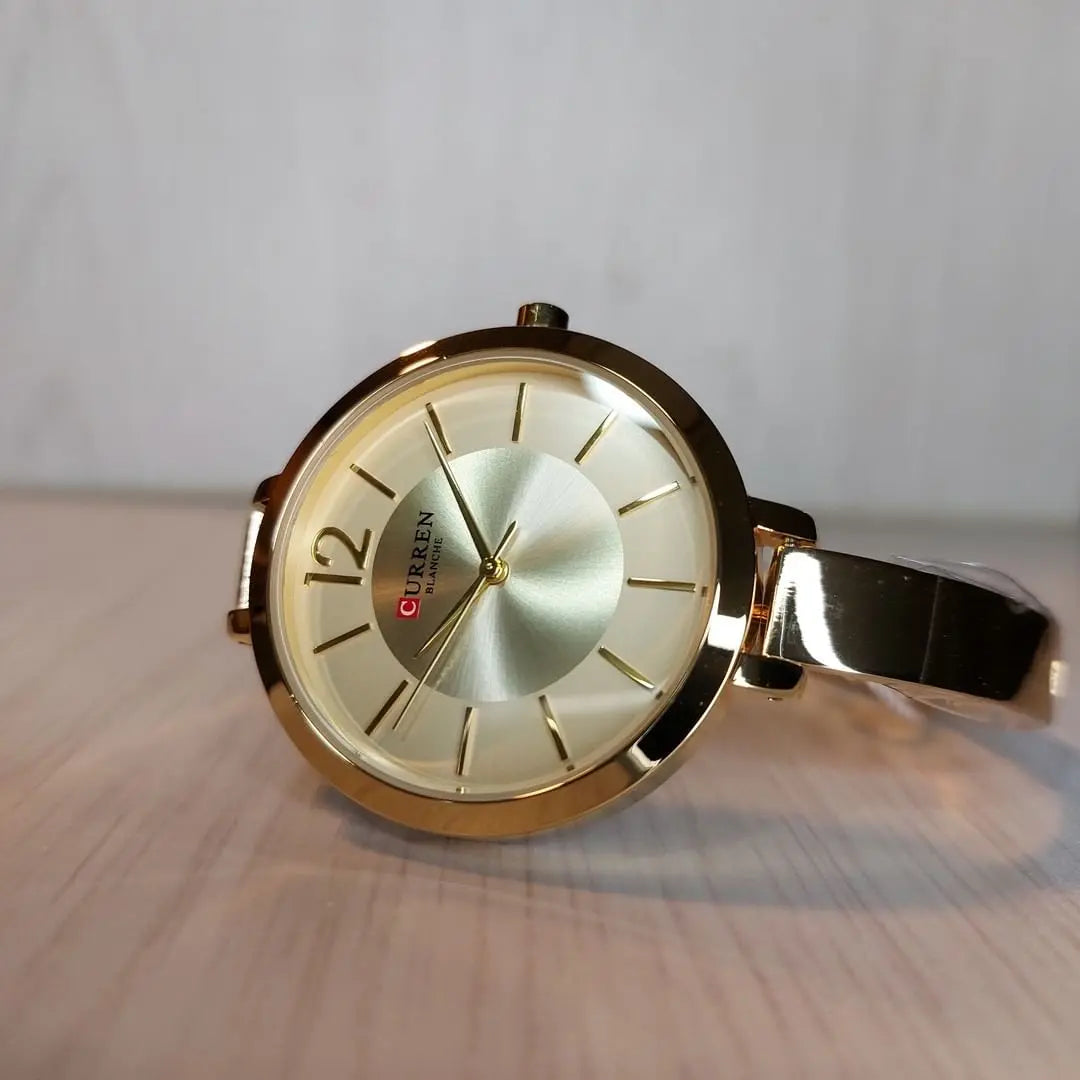 Montre Femme Bracelet Fin couleur or photo cadran